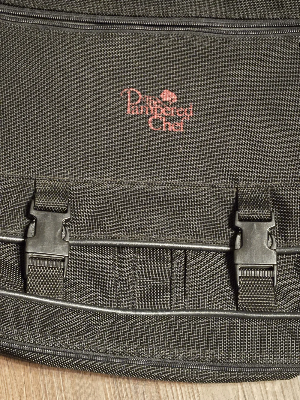 The Pampered Chef Black Serveware Travel Case And Serving Wares.